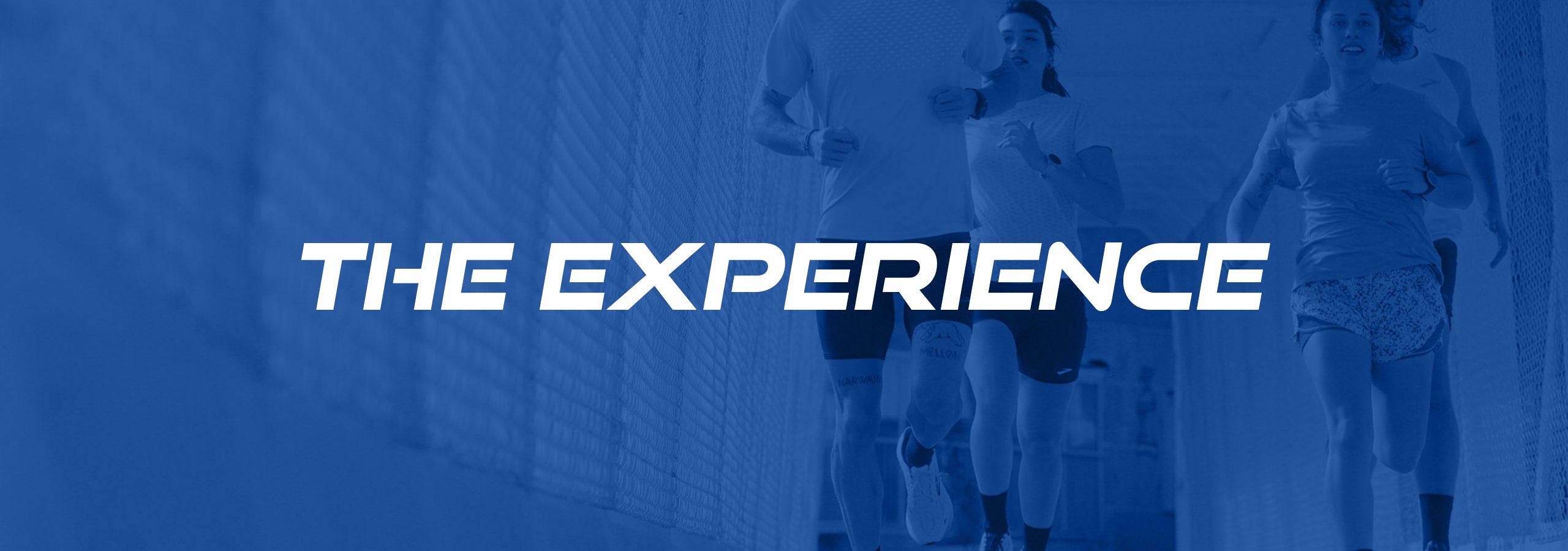 Image of people running with a blue overlay and text reading 'the experience' in white