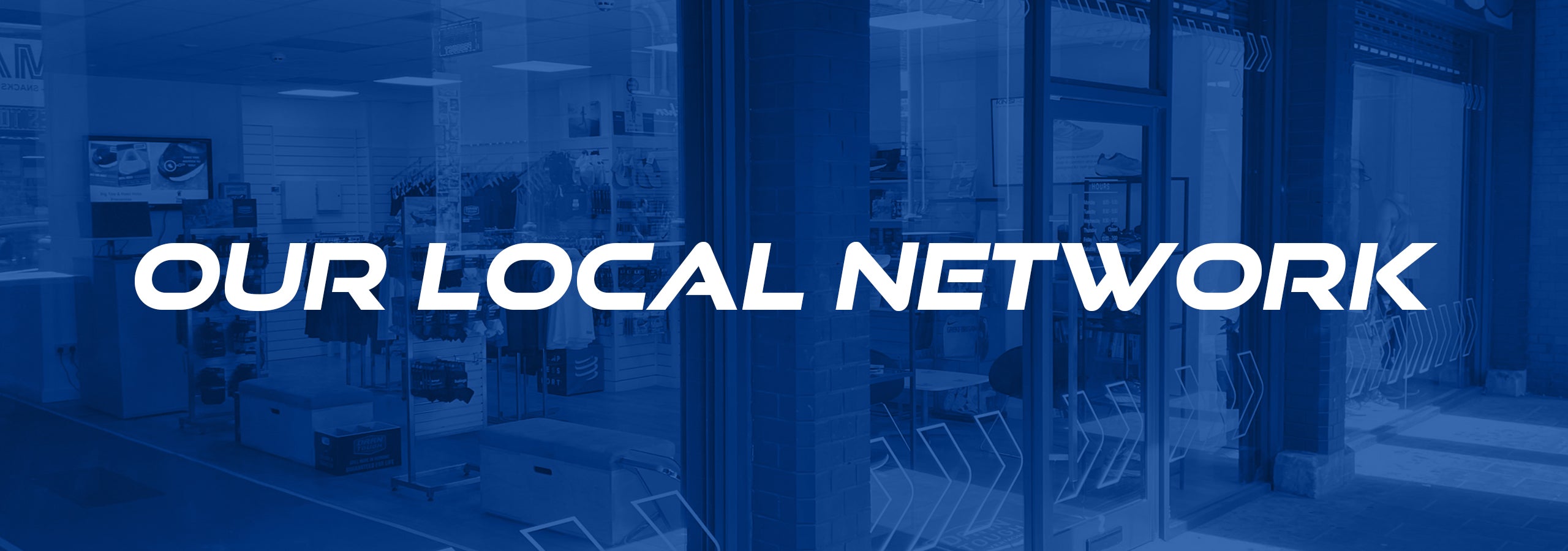 Image of the Kinisi Run Hub storefront with text overlay reading 'our local network'