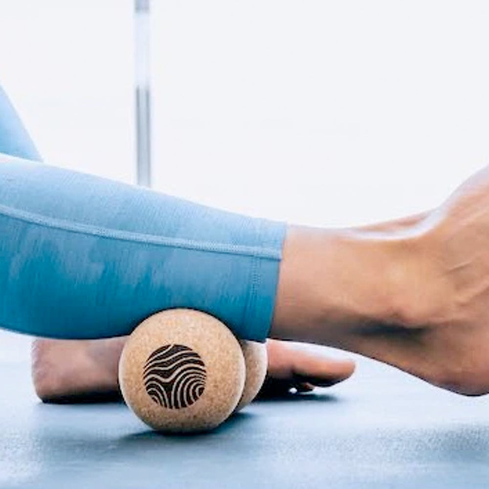 Image of an ankle rolling on a cork roller