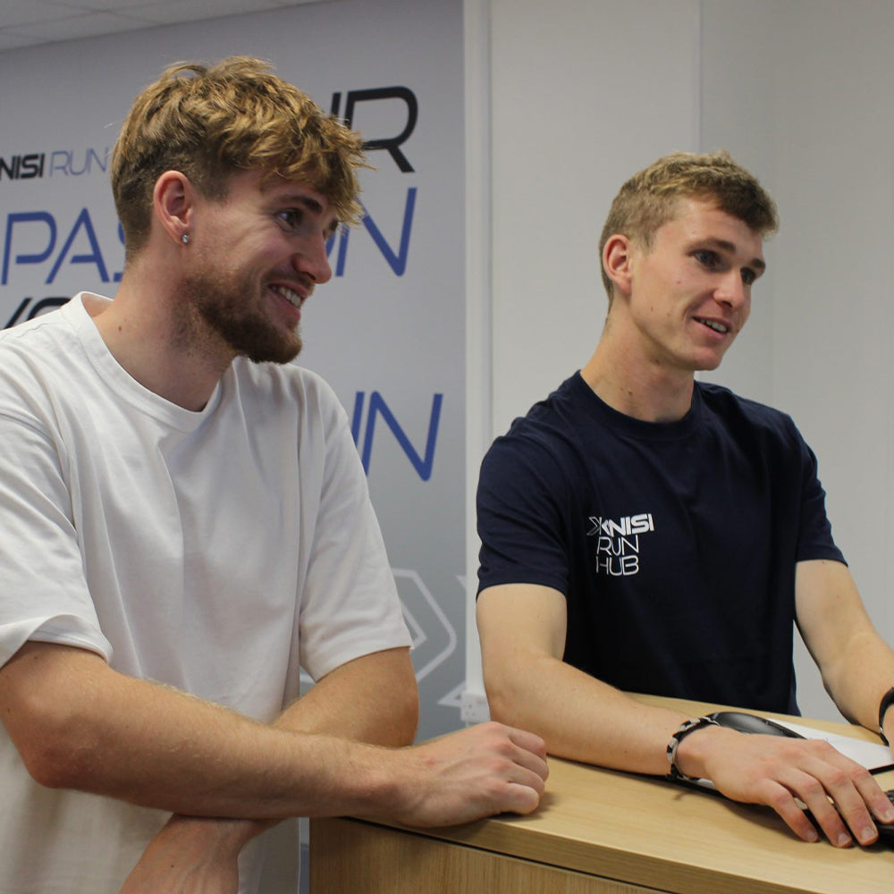 Image of Jamie from Kinisi Run Hub helping a customer